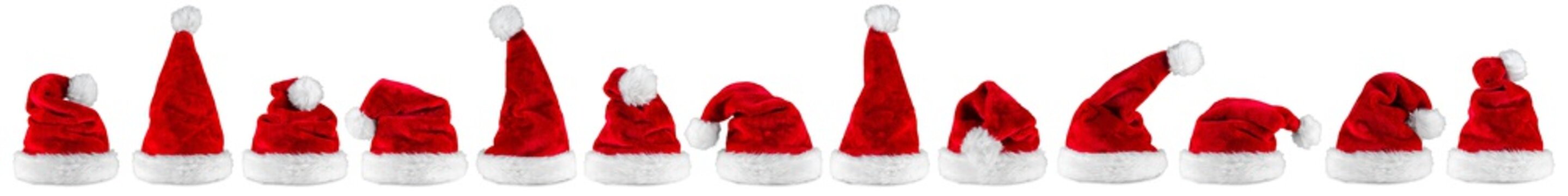 red white christmas santa hats  luxury high quality plush row panorama isolated on white background / Weihnachtsmützen Nikolausmützen Reihe Set  isoliert