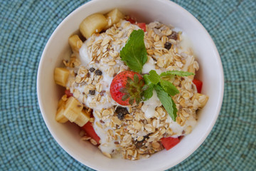 Healthy breakfast - cereal bowl with fruits