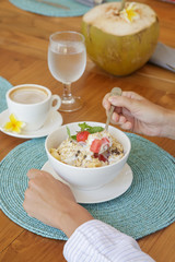 Healthy breakfast - cereal bowl with fruits