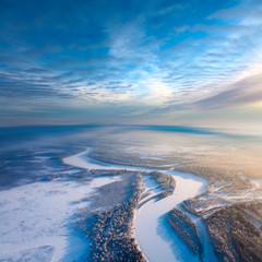 Top view of forest river in winter