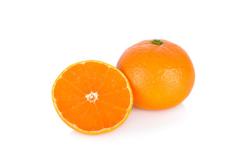 whole and cut ripe orange on white background