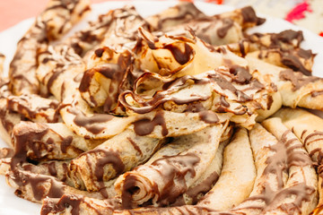Pancakes with chocolate. Close-up