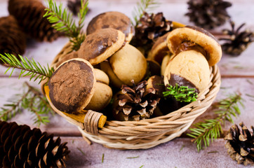 Cookies mushrooms with chocolate icing