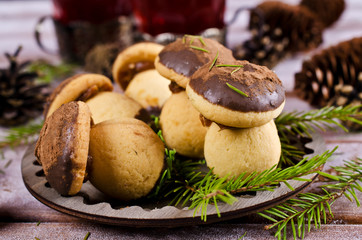 Cookies mushrooms with chocolate icing