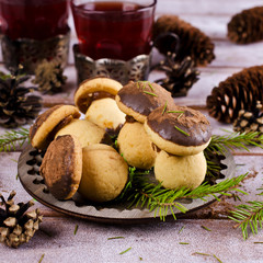 Cookies mushrooms with chocolate icing