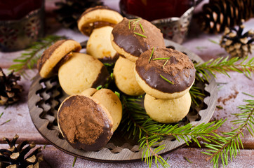 Cookies mushrooms with chocolate icing