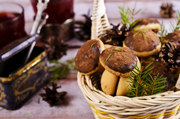 Cookies mushrooms with chocolate icing