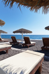 Greece. The east coast of Santorini is famous for its beaches with black volcanic sand