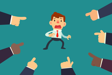 Businessman With Fingers Pointing At Him