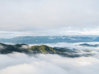 Landscape of moving mist in the mountain and hill. View point of mountain at Doi-Montngo, Chiang Mai –Thailand