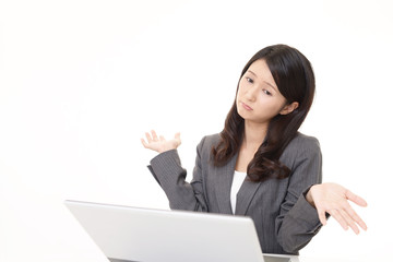 疲れた表情のビジネスウーマン