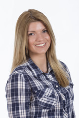 Beautiful girl in plaid shirt smiling