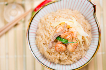 Taiwanese traditional food - Tainan Shrimp rice. With shrimp, ginger, pork, and scallion on top.