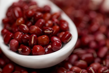 azuki beans , red beans in white spoon.