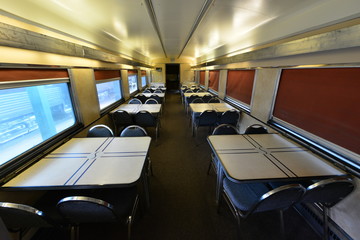 Fototapeta premium Th dining car on a vintage American railway carriage.