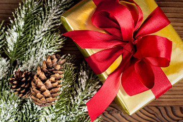 packaging christmas gifts in boxes on wooden background top view