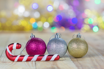 Christmas decoration on wooden table with blurred light background © jat306