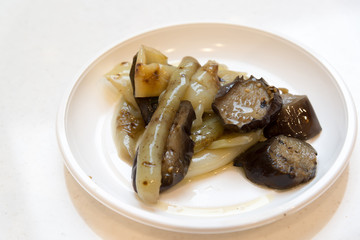Roasted pepper and eggplant on disposable plate