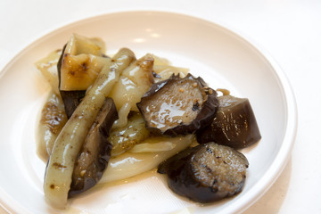 Roasted pepper and eggplant on disposable plate