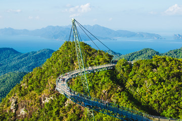 Breathtaking aerial view with Sky bridge, symbol Langkawi, Malaysia. Adventure holiday. Modern technology. Tourist attraction. Travel concept. Andaman sea backgroun - obrazy, fototapety, plakaty