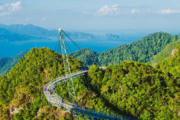 Breathtaking aerial landscape with Sky bridge, symbol Langkawi, Malaysia. Adventure holiday. Modern technology. Tourist attraction. Travel concept. Andaman sea backgroun