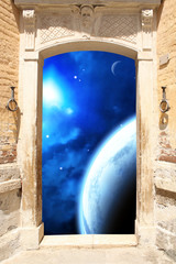 Ancient door and space scene
