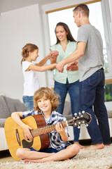 Family dancing and making music