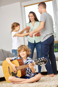 Family Dancing And Making Music