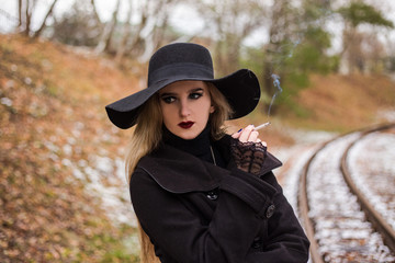 Young woman smoking a cigarette