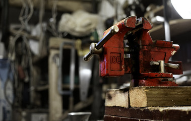 Red vise in a workshop