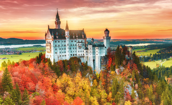 Beautiful view of the Neuschwanstein castle in autumn Neuschwanstein is a palace in Bavaria, Germany. Today Neuschwanstein is one of the most popular of all palaces and castles in Europe and world.