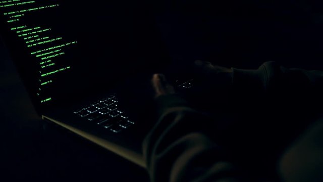 Close up view of typing code.