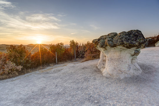 Mushroom rock phenomenon at sunset