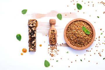 Raw organic bee pollen on shabby wooden board. Bee pollen granul