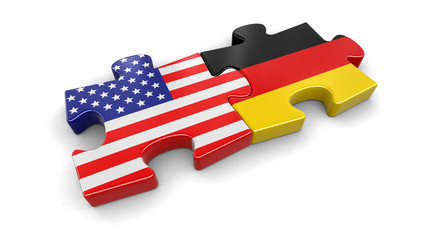 USA and German puzzle from flags. Image with clipping path