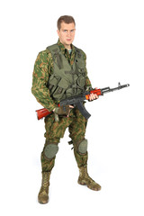 Military serviceman with rifle on white