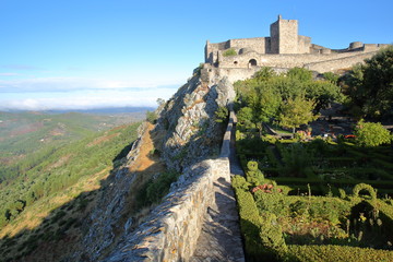 Fototapeta na wymiar MARVAO, PORTUGAL: The walls and the medieval castle with its exterior gardens