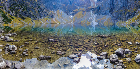 Panoramic view of the Polish Black Pond "Czarny Staw" in the High Tatra Mountains, Poland