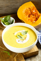 Pumpkin soup with basil and cream