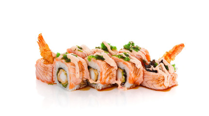 Sushi roll with fried salmon and shrimp in spice sauce isolated on white backgroind