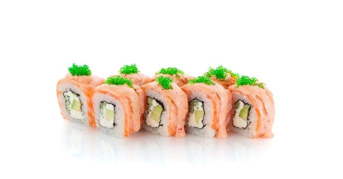 Salmon sushi roll with avocado, green tobiko and spice sauce  isolated on white backgroind