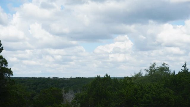 Timelapse video of vast rolling white clouds 