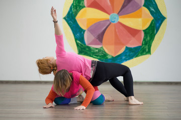 Two women dancing dance contact improvisation
