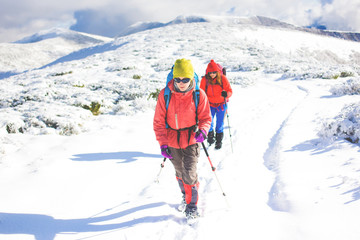 Fototapeta na wymiar Climbers are on snow.
