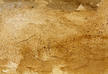 Grungy orange color cement wall surface