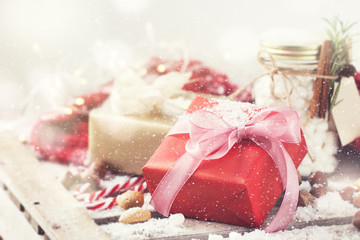 Fototapeta na wymiar Christmas presents or gifts with elegant bow and christmas decor