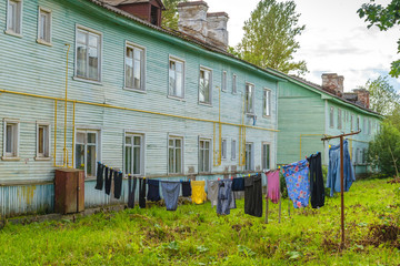 Naklejka premium Clean linen dries on the street on a rope