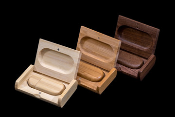 wooden usb isolated on black background