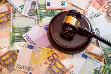 Judge's hammer with  Euro currency