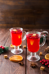 Christmas card. hot spicy Christmas drink of cranberry and spice